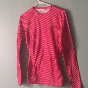 Pink long sleeved under armor shirt
